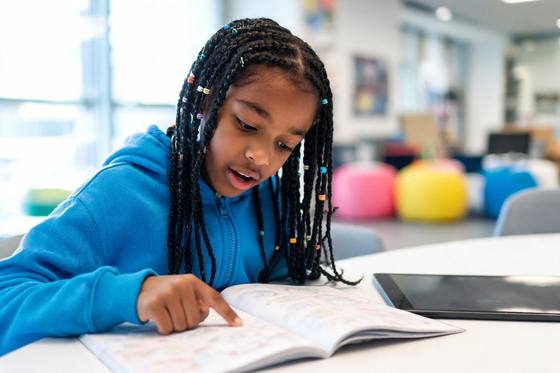 A student reading independently